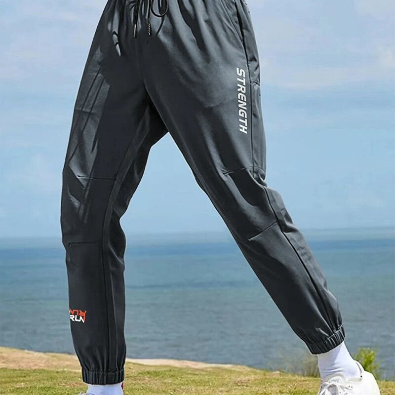2024 nowych męskie spodnie dresowe w stylu Casual mężczyzn/kobiet. Sznurek spodnie do biegania Fitness spodnie do joggingu oddychające spodnie Fitness