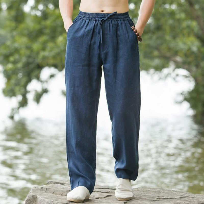 Calça de cintura elástica masculina, calça casual estilo japonês, moletom de perna larga com bolsos laterais, cordão para conforto