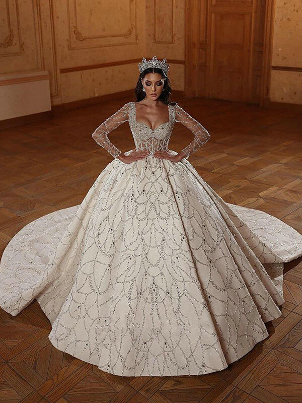 Stunning Wedding Dress Long Sleeves Sweetheart Illusion Bridal Gowns Custom Made Sequined Cathedral Train Vestido de novia