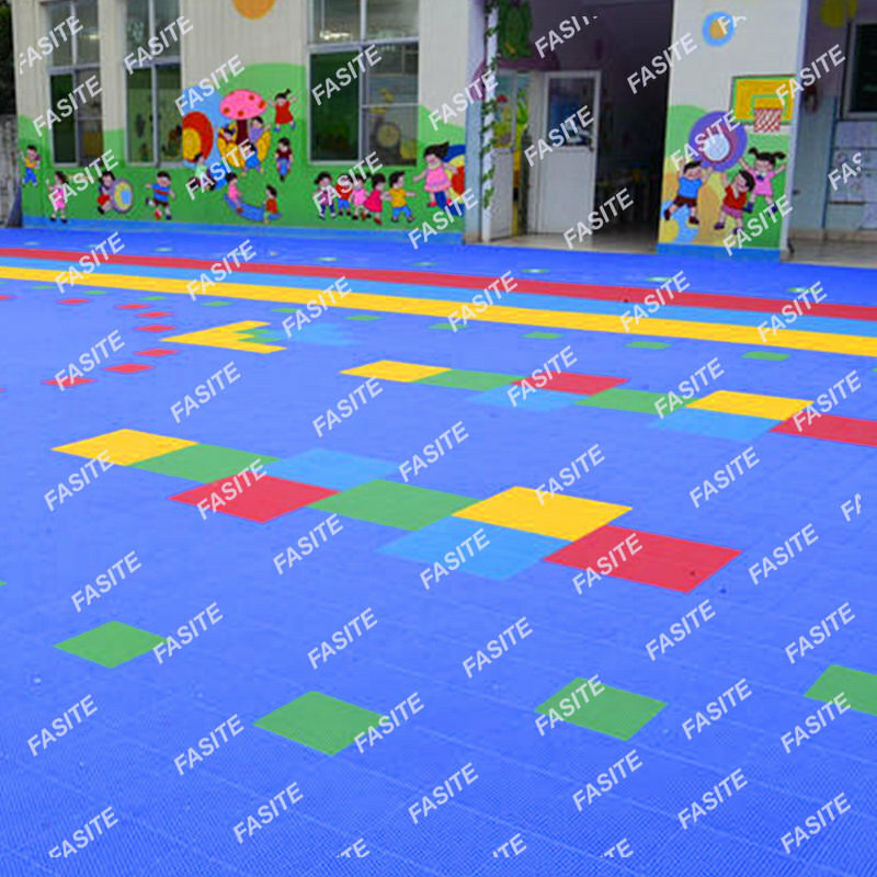 Suspended floor kindergarten outdoor anti-slip badminton basketball playground running track assembled plastic mat manufacturers