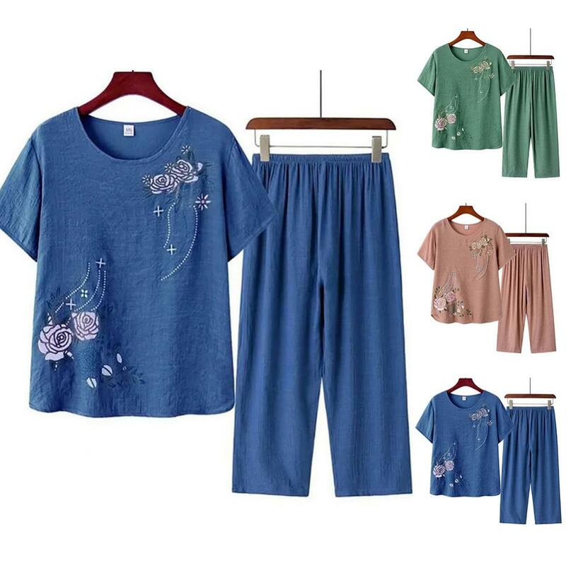 女性用半袖Tシャツ,トップスとパンツ,花柄,ルーズフィット,家庭用服