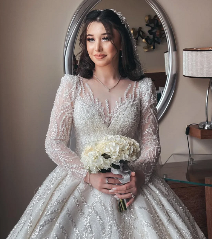 Suknia balowa Flavinke suknie ślubne 2024 błyszcząca koronka O dekolt z cekinami długi rękaw Vestido Casamento muzułmańskie suknie ślubne