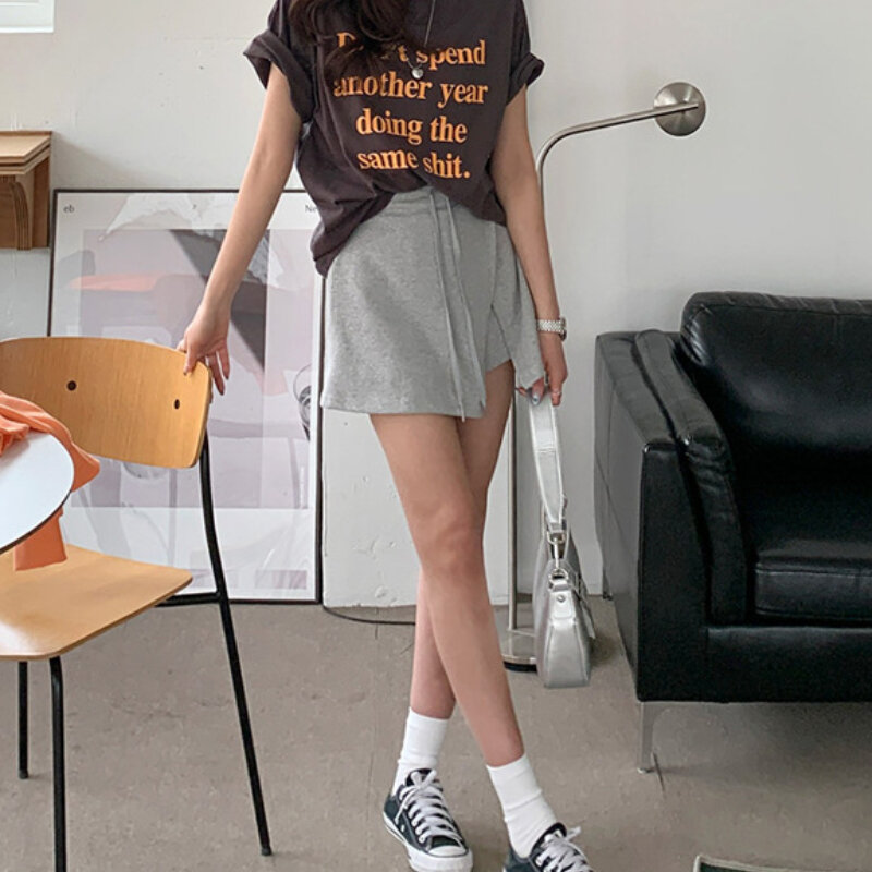 Falda acampanada informal holgada de cintura alta para mujer, minifalda Sexy coreana con cordón, Color sólido, combina con todo, 2024