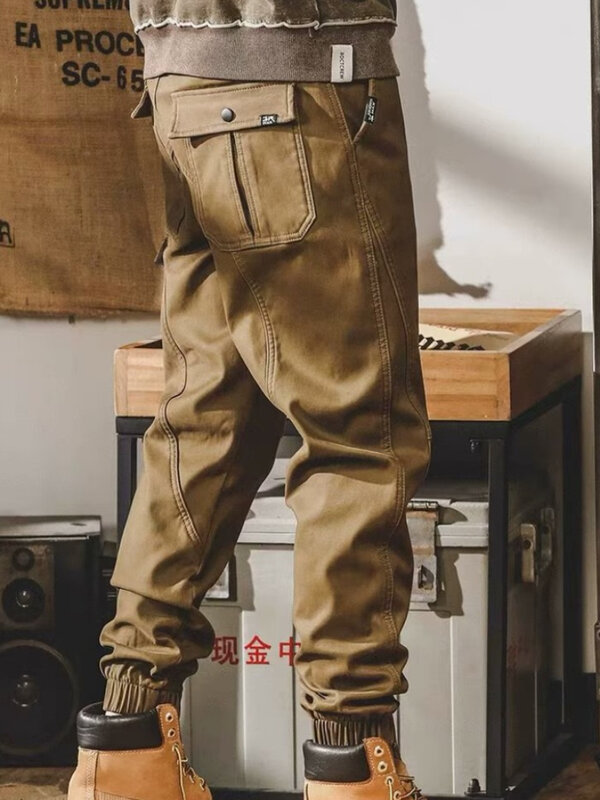 Spodnie robocze w stylu Vintage z luźny krój dla mężczyzn Plus rozmiar 2024 wiosna na co dzień jeansów jednolite kolory designerskie spodnie spodnie z paskiem na kostce