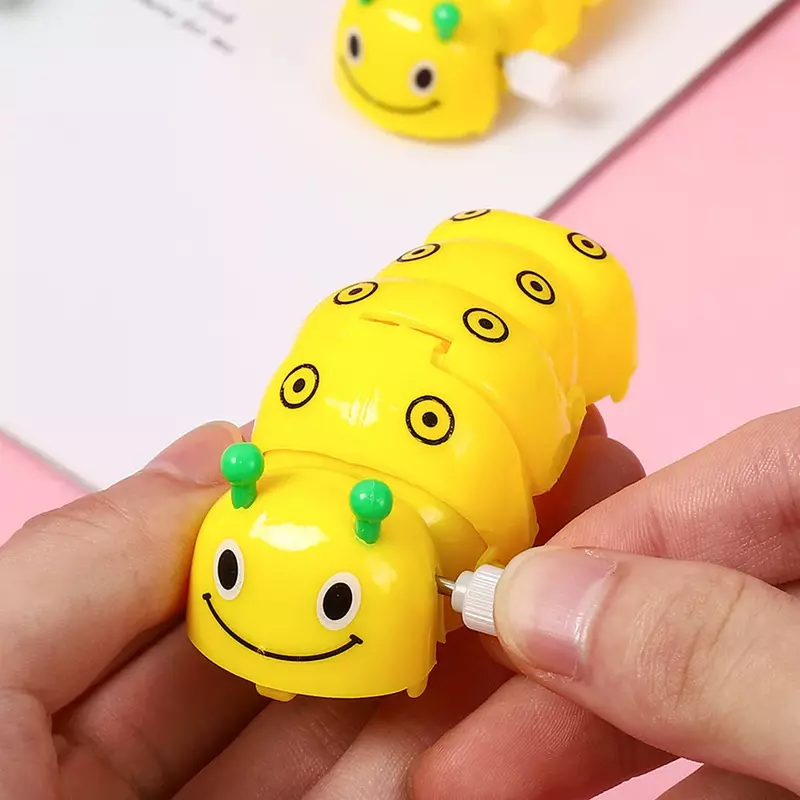 Orologio Caterpillar Toy giocattoli per bambini bruchi classici in plastica Cartoon Wind Up giocattoli per bambini giochi divertenti ragazzi ragazze