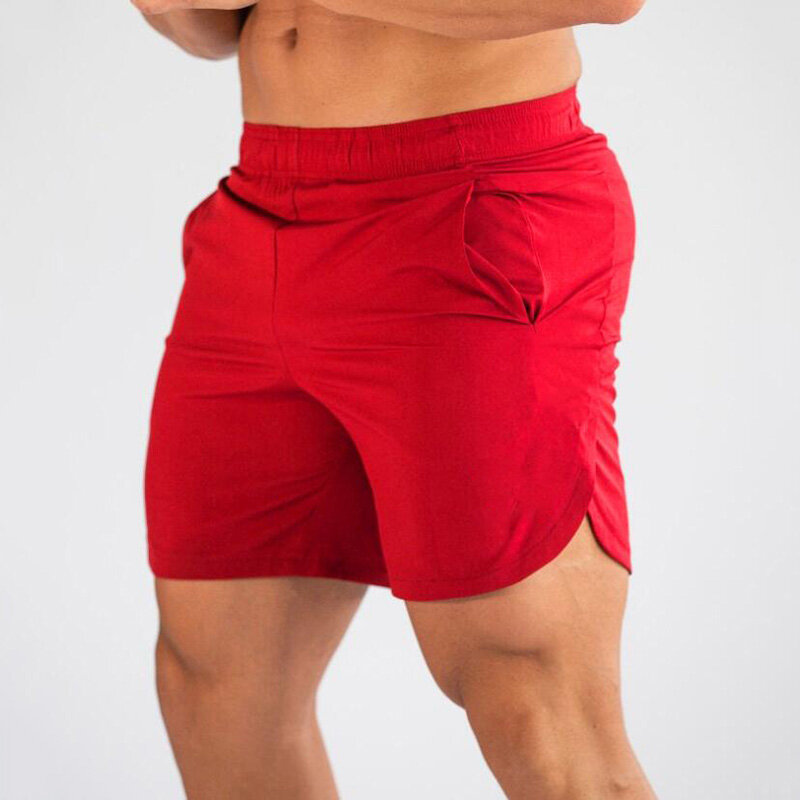 กางเกงวิ่งขาสั้นผู้ชายสำหรับฤดูร้อนกางเกงวอร์มสำหรับออกกำลังกายฟิตเนสกางเกงขาสั้นแห้งเร็วสีพื้น