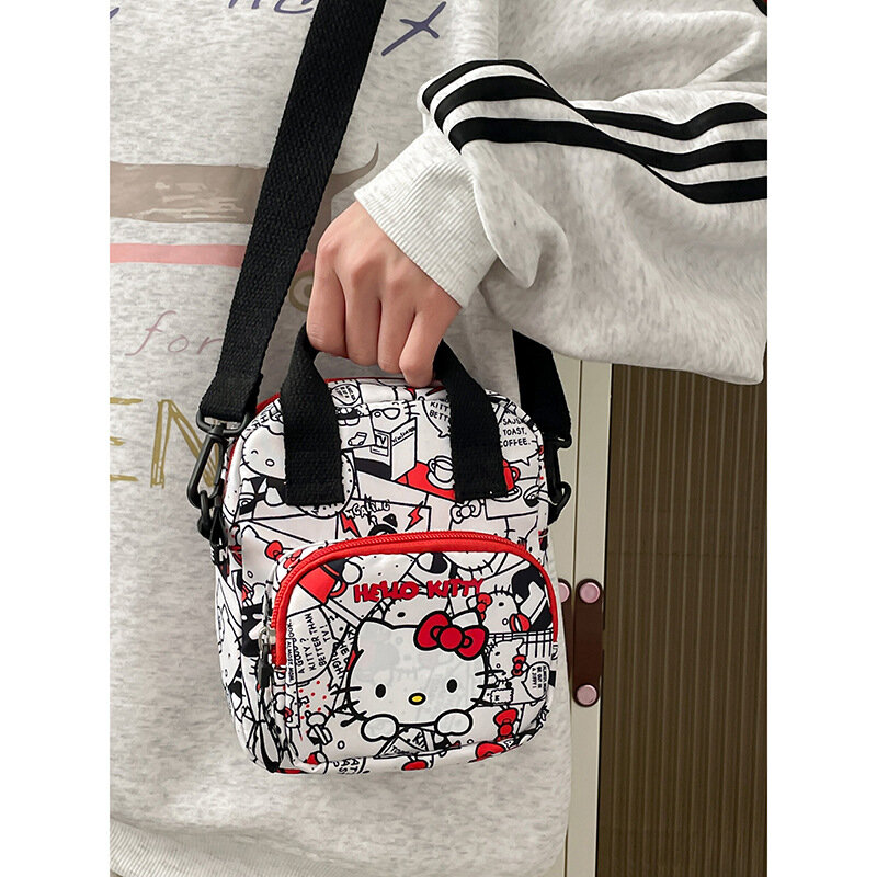 Sanrio-Bolso de hombro de Hello Kitty para mujer, bandolera de lona con estampado KT de dibujos animados, gran capacidad, para viaje