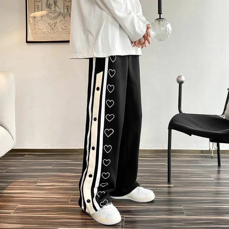 Harajuku pantaloni sportivi a gamba larga Oversize uomo Streetwear pantaloni larghi con bottoni laterali pantaloni sportivi Casual da basket divisi da donna