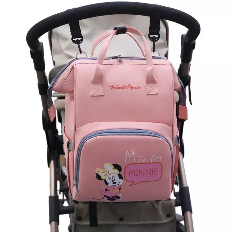 Disney ใหม่แฟชั่นทารกผ้าอ้อมกระเป๋าคลอดบุตรขนาดใหญ่เด็กรถเข็นเด็กกระเป๋าเป้สะพายหลัง Mickey Mouse กระเป๋าผ้าอ้อมเด็ก