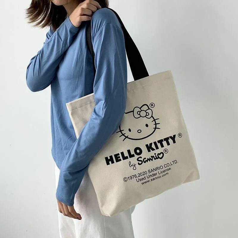 مرحبا كيتي سانريو قماش حقيبة الكتف موضة حمل عالية السعة عادية طباعة أنيمي حقيبة يد السيدات قابلة لإعادة الاستخدام المتسوق حمل حقيبة