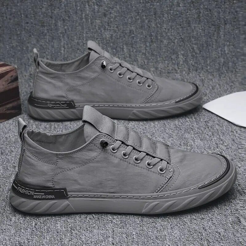 Zapatillas deportivas vulcanizadas de lona con cordones para hombre, zapatos informales cómodos, calzado plano ventilado, novedad de 2024