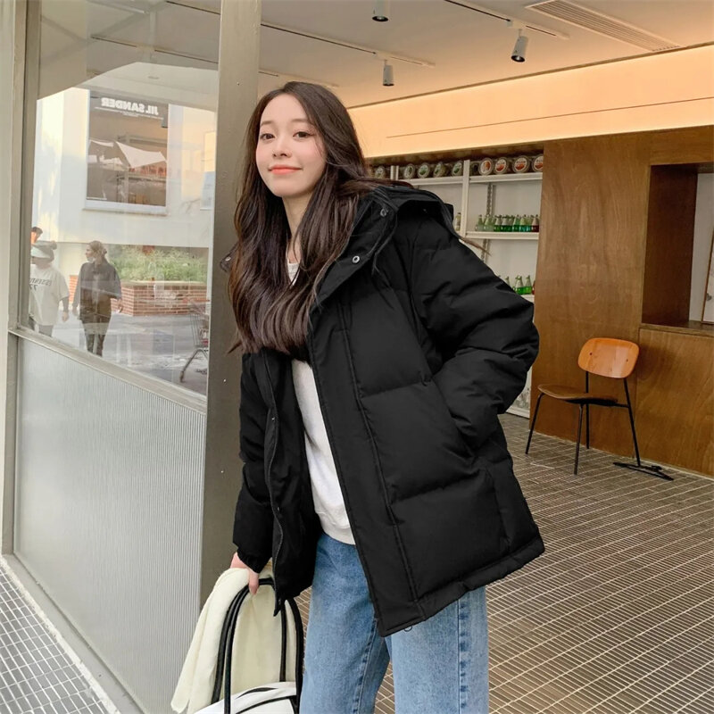 2023 inverno nuovo piumino di cotone con cappuccio versione coreana cappotto allentato da donna elegante moda per il tempo libero capispalla femminile