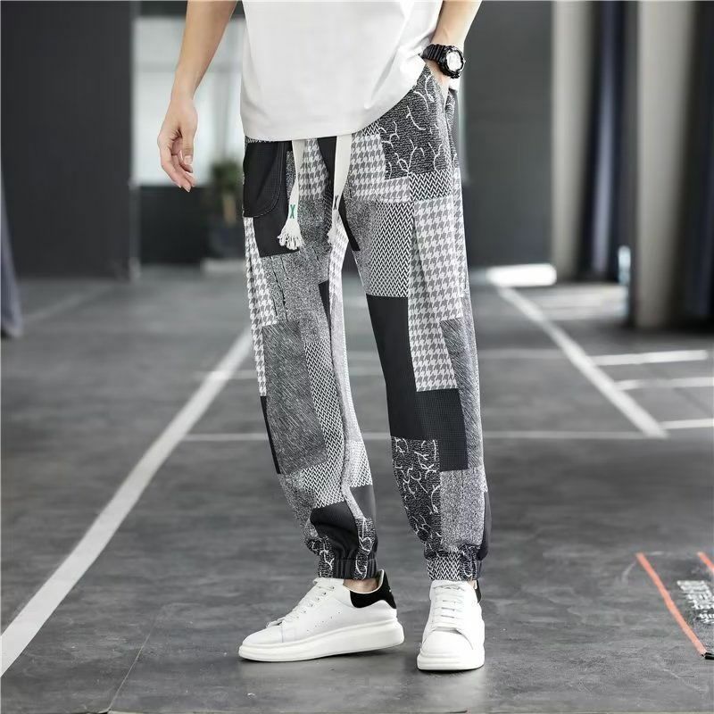 Wiosenne letnie nowe modne spodnie z wysokim stanem luźne nadruk w stylu Vintage spodnie Harajuku patchworkowe jedwabne młodzieżowe ubrania męskie