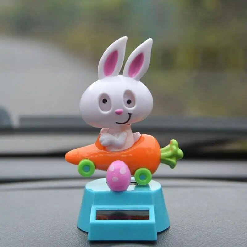 Giocattoli da ballo solari coniglio creativo seduto In auto carota decorazione auto solare carina decorazione auto ornamenti figura oscillante