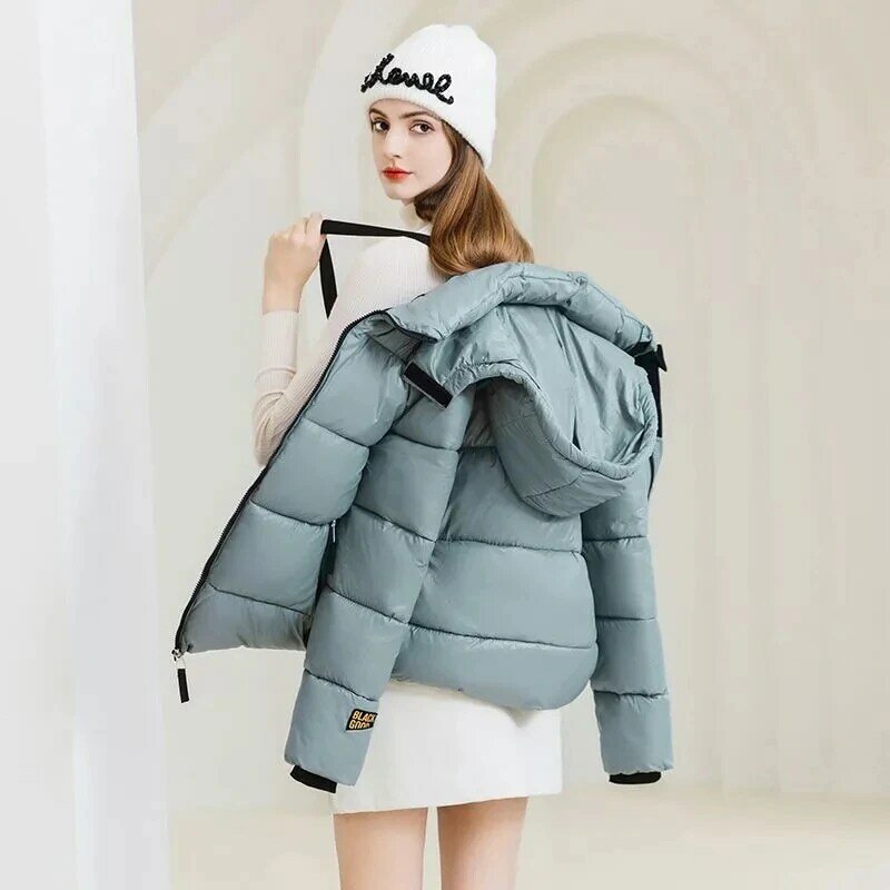 Puchowy kurtka podszyta bawełną damski płaszcz 2023 nowy jesienno-zimowy gruby ciepły Parker modny luźny z kapturem pary zimne Coa