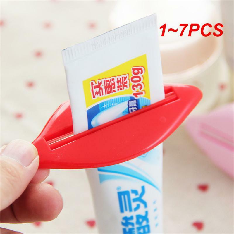 1 ~ 7 buah pemegang pasta gigi merah serbaguna Fasilitas kamar mandi 5.2g Dispenser peras rol dua warna pilihan jumlah besar