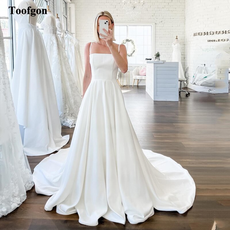 Toofgon ชุดเดรสแต่งงานผ้าซาตินสายรัดสปาเก็ตตี้สำหรับเจ้าสาวชุดเดรสงานแต่งงานแบบเรียบง่าย