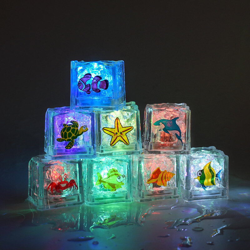 8ชิ้น/ล็อตห้องน้ำเด็กของเล่นเด็กเล่นน้ำ Ocean Magic Ice Cube ไฟ Ocean สัตว์ที่มีสีสันไฟของขวัญเด็ก