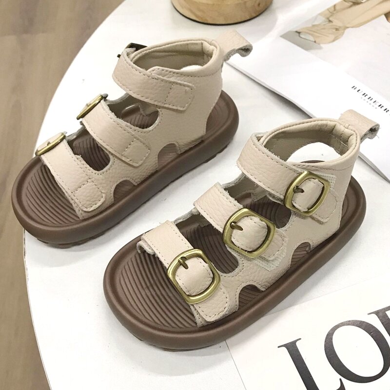 Sepatu bot pendek anak wanita, sandal modis kulit asli polos Gladiator sepatu musim panas untuk anak-anak krem cokelat hitam kasual