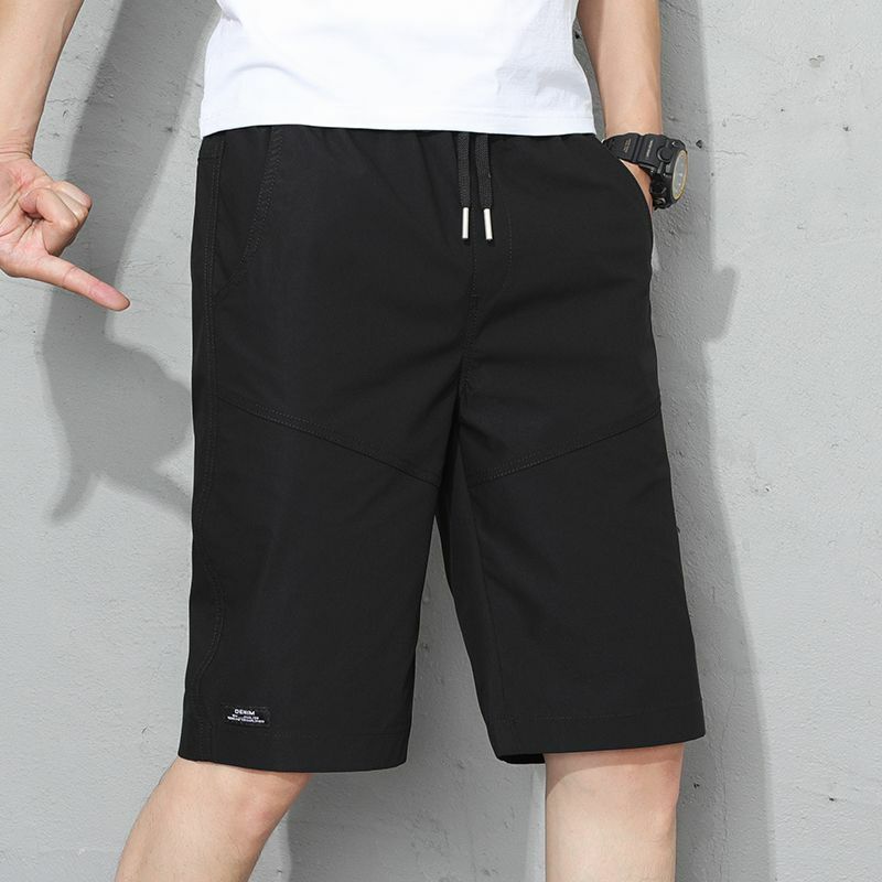 Celana pendek kasual longgar pria, celana pendek kain sutra es gaya tipis musim panas olahraga trendi