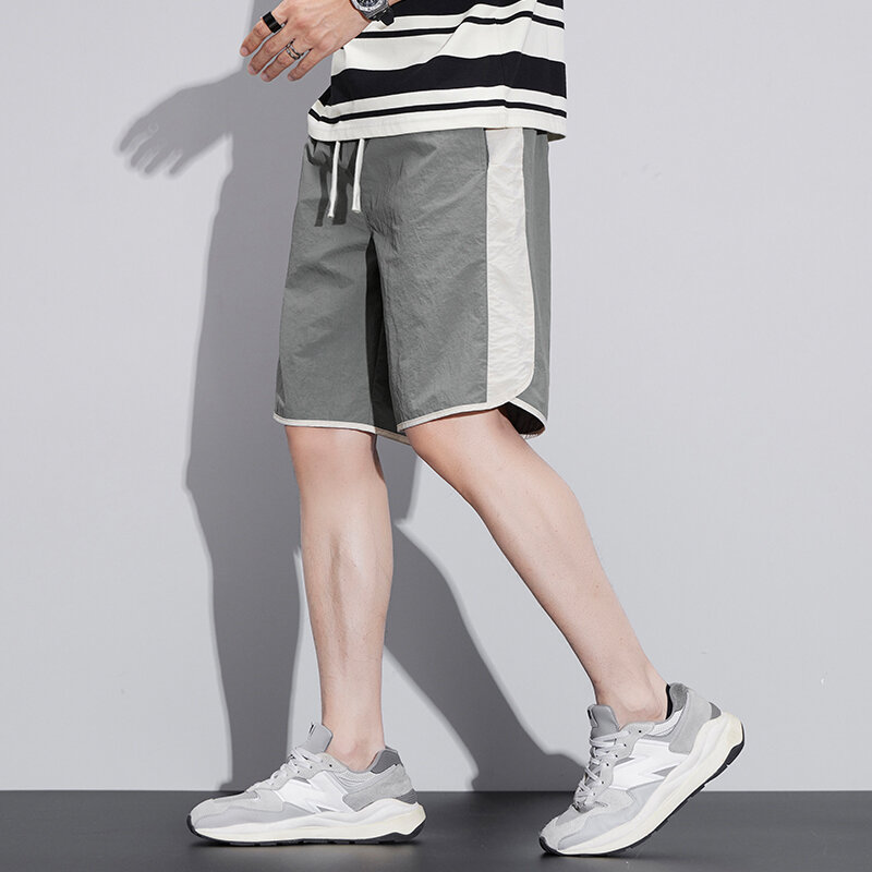 Мужские свободные спортивные шорты, повседневные шорты контрастных цветов в стиле пэчворк с эластичным шнурком, лето 2024
