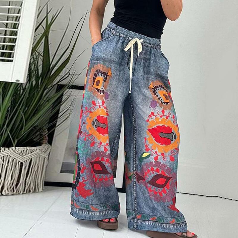 Calças de cintura elástica feminina com bolsos, jeans de imitação, calças de perna larga, estampados coloridos, design exagerado