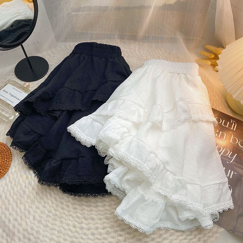 Elastic เอวสีขาวสีดำไม่สม่ำเสมอ Mini Kawaii กระโปรงญี่ปุ่นสไตล์ Y2k ความงาม Ruffles กระโปรงสั้นผู้หญิง Streetwear