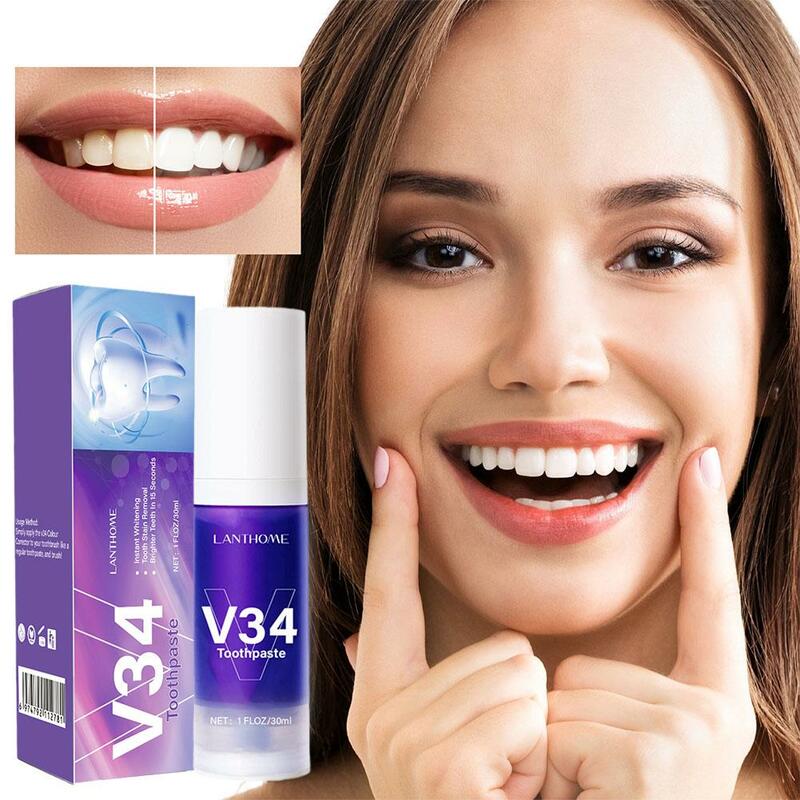 ยาสีฟันสีม่วงฟอกสีฟัน V34ขจัดคราบฟันขาวกระจ่างใสตัวแก้ไขสีลมหายใจสดชื่นช่วยในช่องปาก