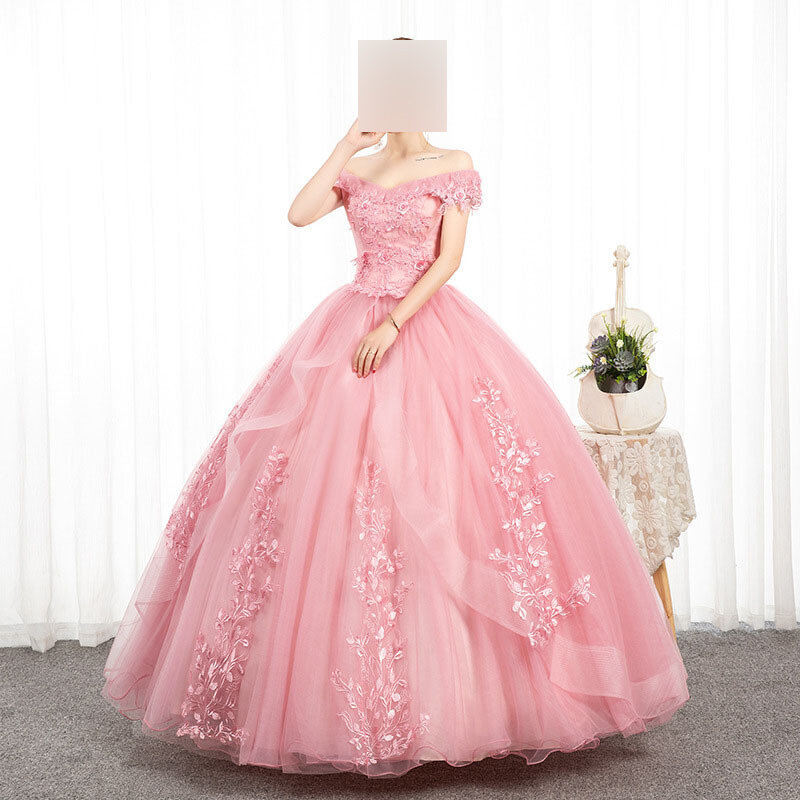 女性のためのピンクのQuinceaneraドレス,裸の肩のアップリケが付いた非対称のパーティードレス