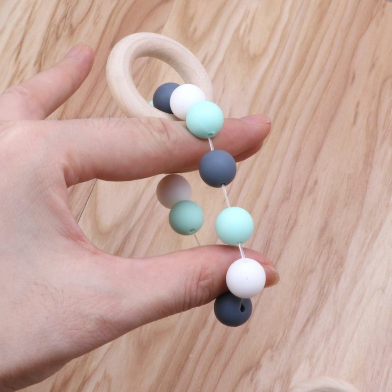 2022 neue Baby Pflege Armbänder Holz Beißring Silikon Chew Perlen Zahnen Rasseln Spielzeug Beißring Montessori Armbänder