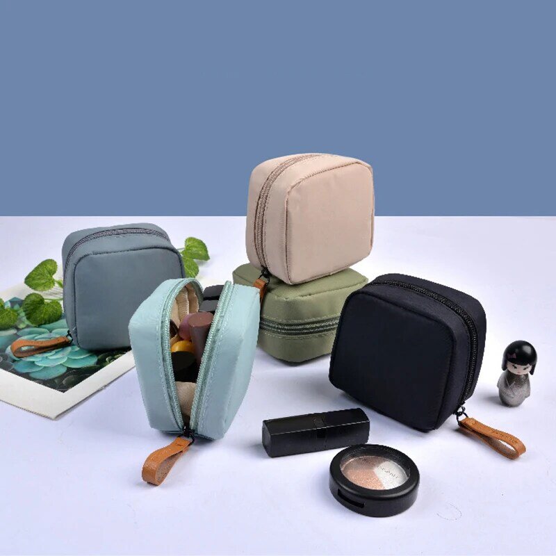 Bolsa de maquillaje portátil para mujer, de Color sólido neceser de viaje, organizador de cosméticos, servilleta sanitaria