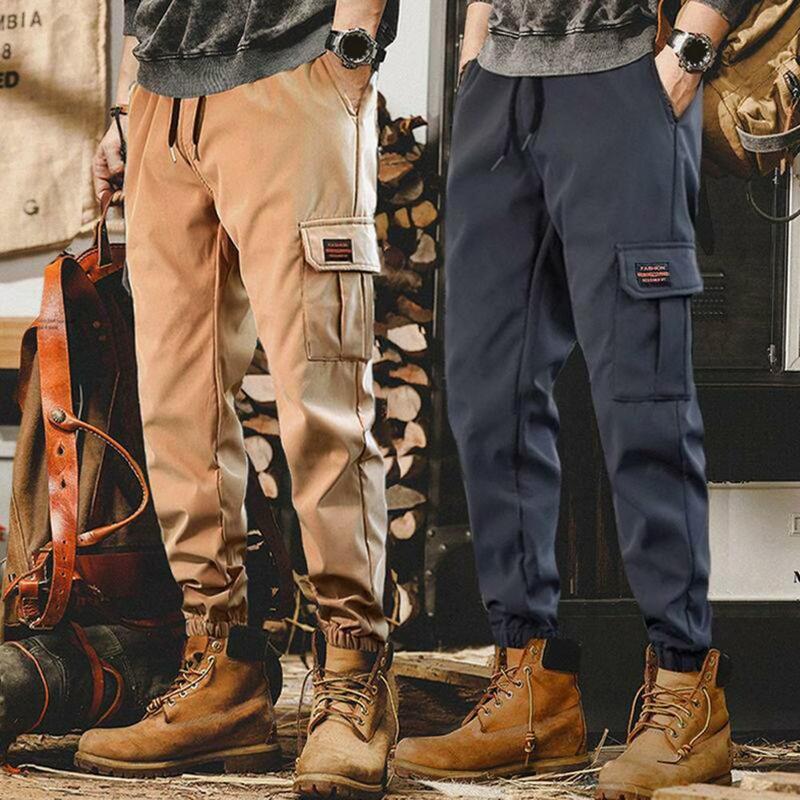 Calça de cintura elástica masculina com bolsos múltiplos, streetwear versátil, primavera, outono, primavera