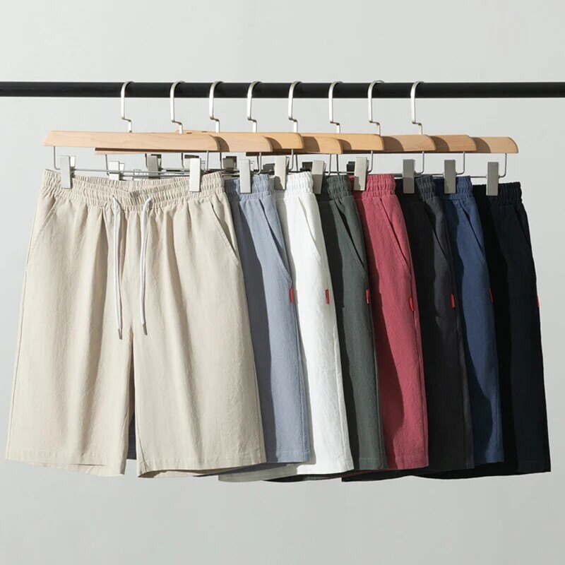 Nowe męskie spodnie spodenki z bawełny i lnu męskie letnie oddychające spodnie bielizna w jednym kolorze Fitness Streetwear sznurowane spodnie