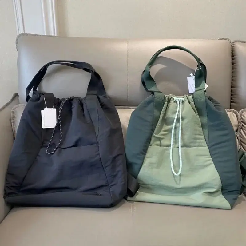 Unisex shoulder sports bag, waterproof multi-purpose drawstring storage, large capacity yoga bag with metal logo
