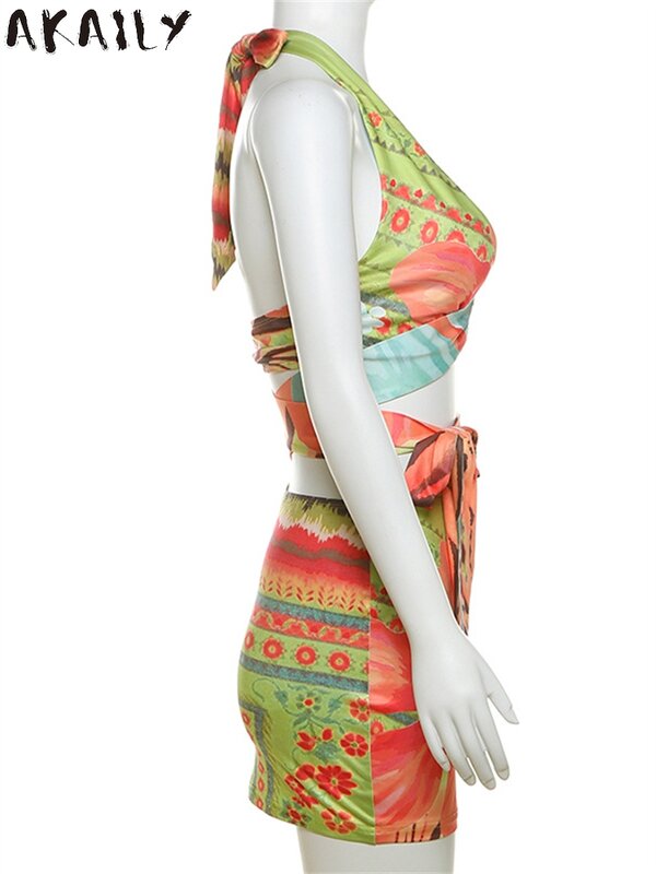 Akaily-女性のカラフルなプリントビーチ2ピースセット、セクシーなホルタートップ、クロス包帯タンクトップとスカート、休暇の衣装、夏