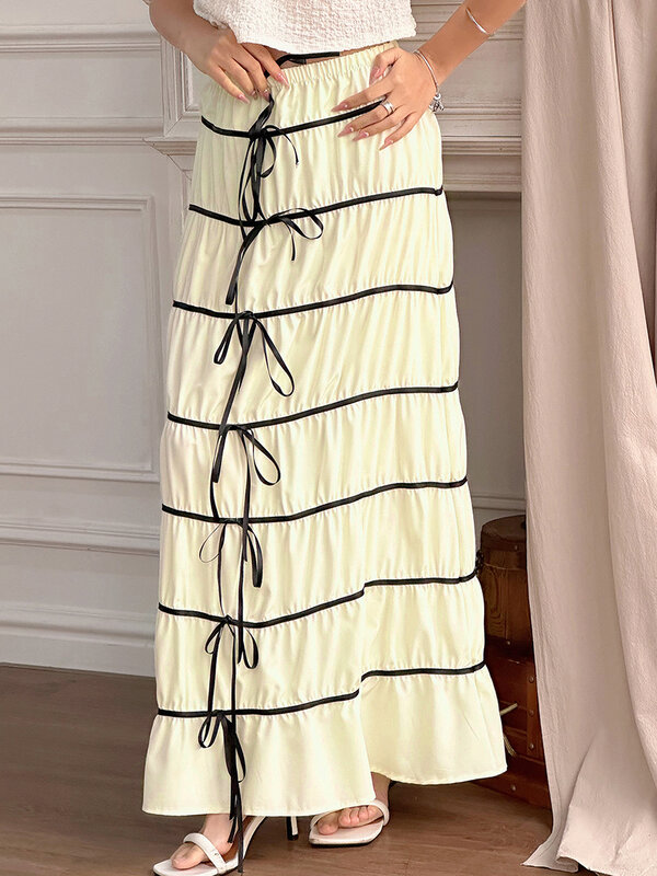 Damen Sommer-Beige niedlichen Midi-Rock Kontrast elastische Taille Bogen Dekoration A-Linie Rock Street Fashion Kleidung