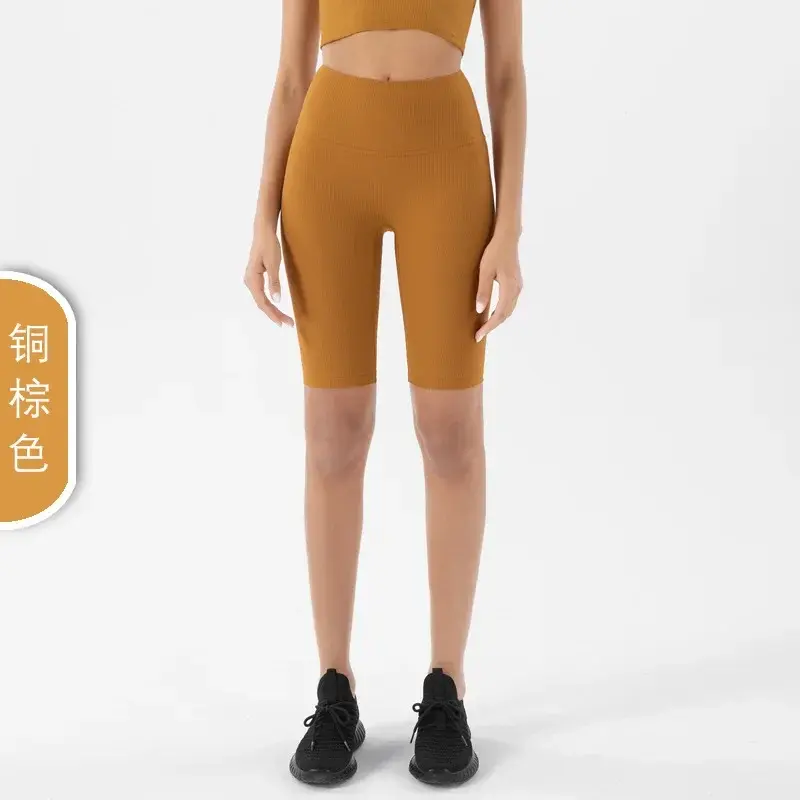 Европейские и американские телесные штаны для йоги с резьбой женские персиковые спортивные шорты для фитнеса с высокой талией и подтягиванием бедер.