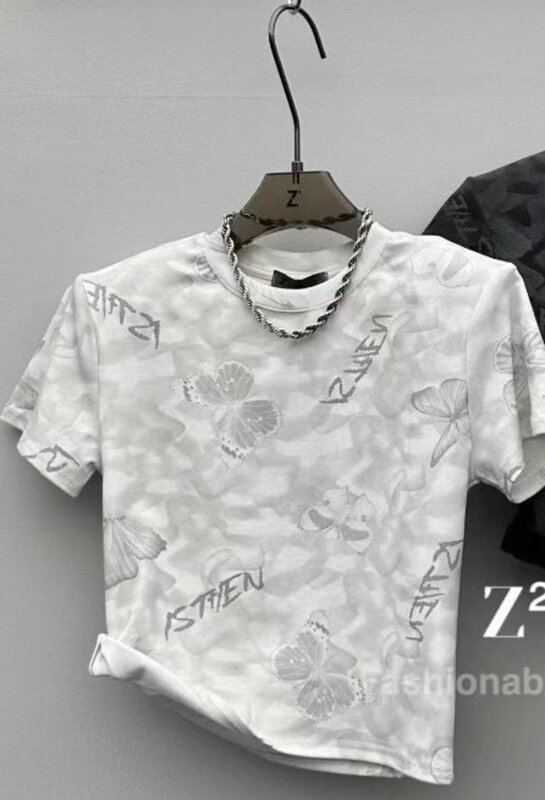 Camiseta de manga corta versión coreana para mujer, blusa con estampado de mariposa china, Top con hombreras cortas a la moda, novedad de verano 2024
