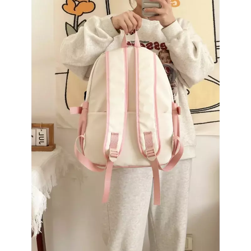 Sanrio-mochila escolar de Hello Kitty para hombre y mujer, bonita mochila de gran capacidad con hombrera de dibujos animados, novedad