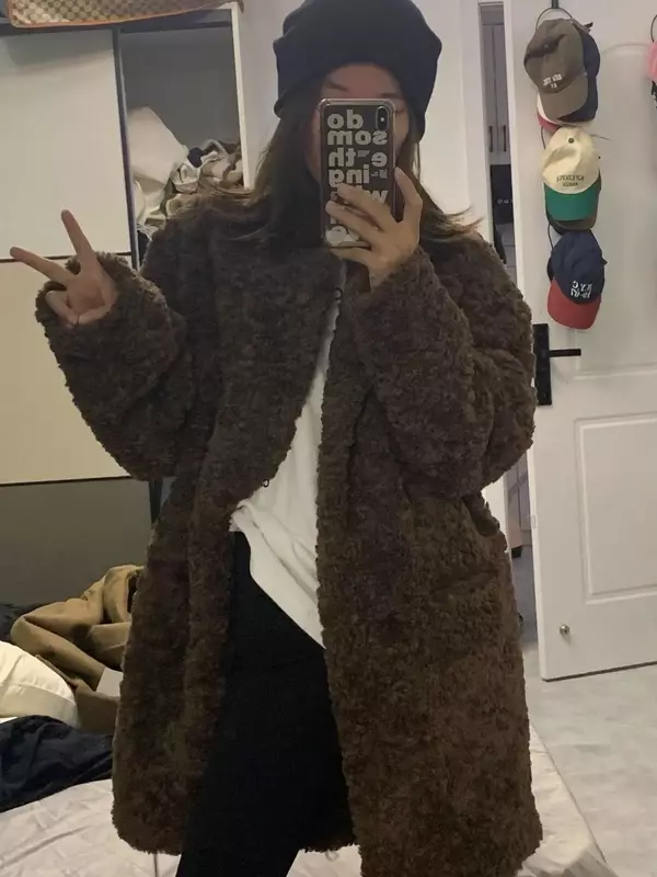 Cappotto di lana di agnello donna autunno e inverno 2023 nuovo cappotto di pelliccia sintetica lungo coreano di media lunghezza addensato di fascia alta