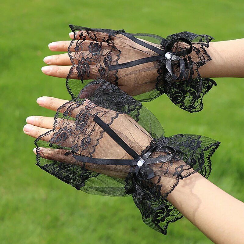 ถุงมือแขนปลอมลูกไม้สีดำสำหรับผู้หญิง1คู่กำไลข้อมือสำหรับงานปาร์ตี้ถุงมือครึ่งนิ้วมีโบว์กันแดด