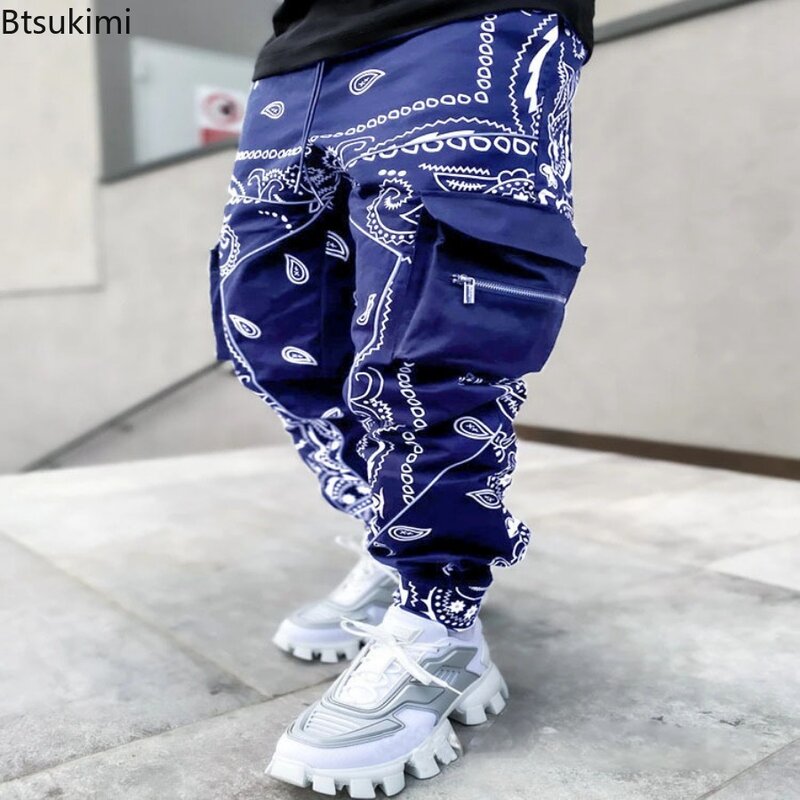 Nowe męskie spodnie Cargo z modnym nadrukiem luźna moda Hip Hop odzież uliczna duża kieszeń kombinezony męskie jaskrawe spodnie cztery pory roku