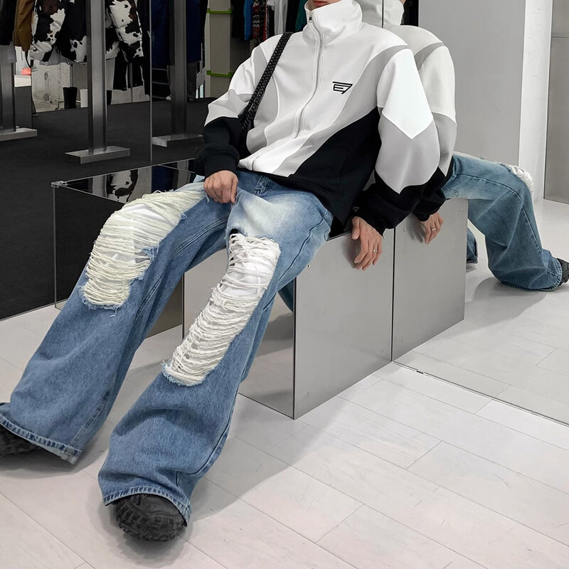 Pakaian pria 2024 jalan Amerika tren longgar warna kontras Jeans robek rusak lurus modis celana kasual