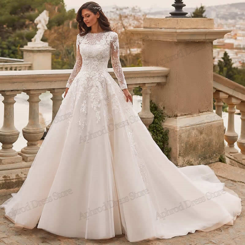 Skromne suknie ślubne z pełnym rękawem suknie ślubne z okrągłym dekoltem i dekoltem koronkowe aplikacje do podłogi dla panny młodej efektowne Vestidos De Novia