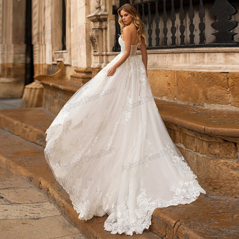Gaun pengantin indah gaun pengantin cantik renda applique dengan kereta dapat dilepas tanpa tali seksi Backless Vestidos De Novia