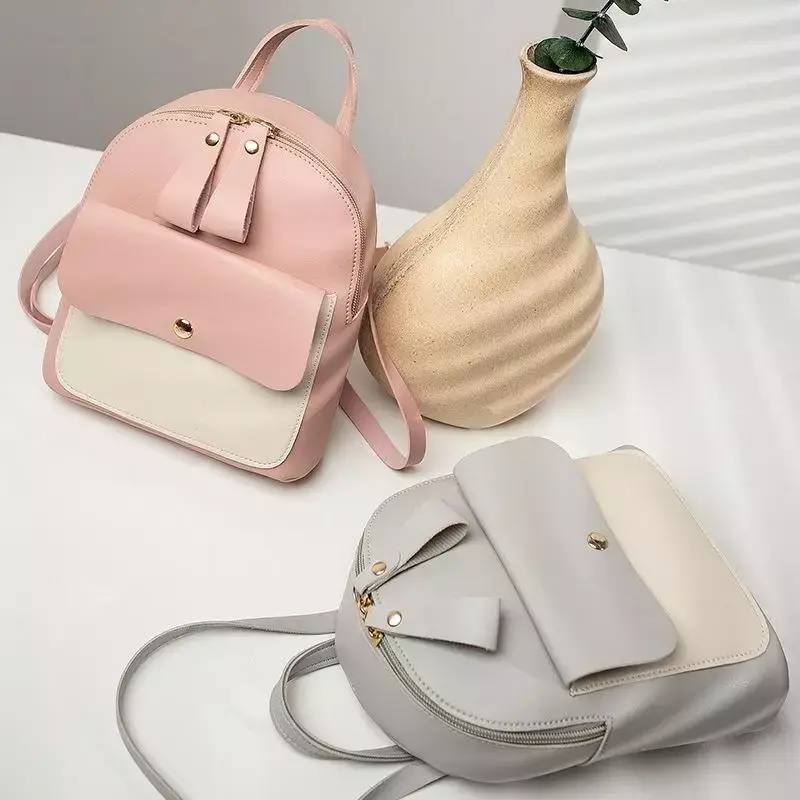 Der kleine Rucksack der neuen koreanischen Version kann über eine Schulter gekippt werden und verfügt über mehrere Funktionen, die einfach und farbenfroh sind