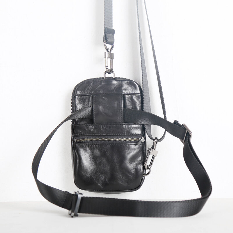 Nowe mody mężczyzna Mini torebka z prawdziwej skóry owczej małe saszetki na pas Unisex torba listonoszka na ramię przechowywania telefon torba w klatce piersiowej