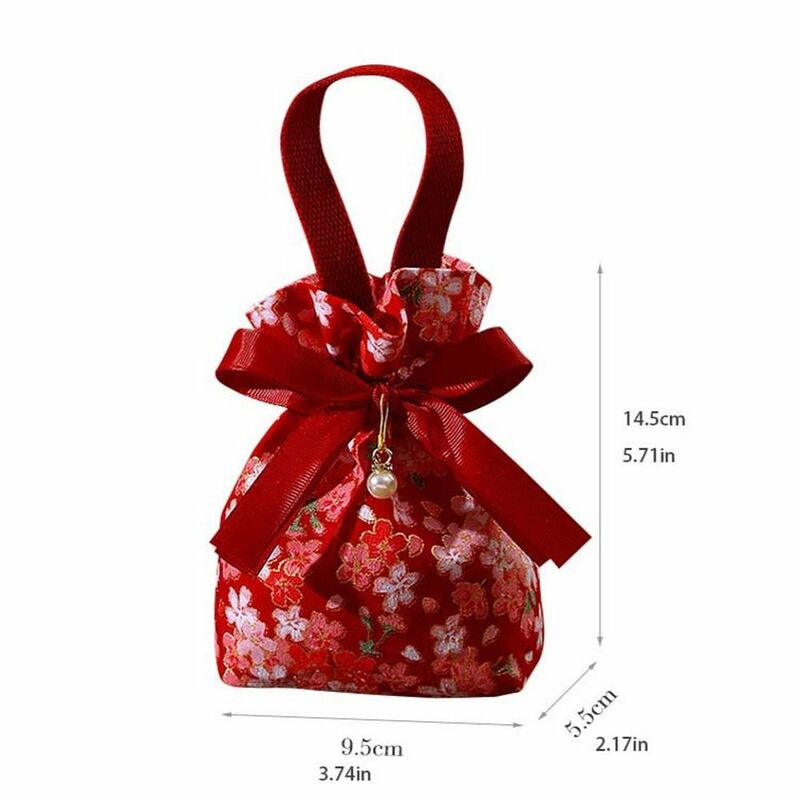 Borsa con coulisse fiore floreale borsa da polso in tela con ciondolo perla di grande capacità borsa da imballaggio Jewerly stile coreano