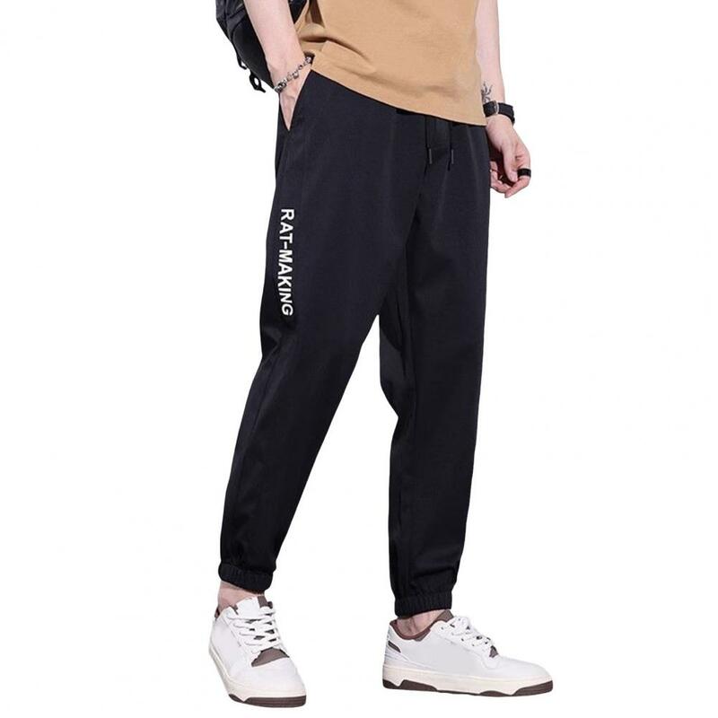 Celana Harem pria, celana sutra es saku di samping pinggang elastis warna Solid latihan kebugaran Jogging