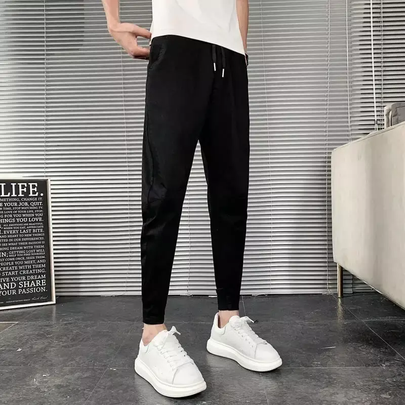 กางเกงลำลอง MODE Korea สลิมฟิตกางเกงผู้ชายกางเกงเลกกิ้งเอวสูงแบบมีเชือกรูดสีดำมีกระเป๋าฤดูร้อนใหม่